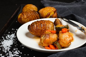 Roasted chicken drumsticks with hassel back potatoes
