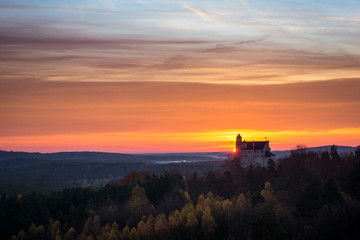Sunrise over the castle in Bobolice, Silesia, Poland