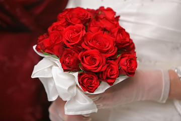 bouquet of flowers in the hands of the bride