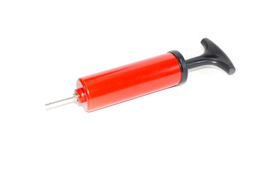 The pump to inflate balls on a white background.