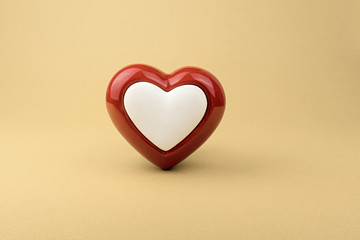 Red heart on yellow background