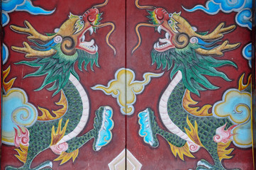 Painted of Dragon at the door of The Chinese temple 