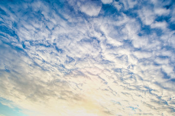 Bright Blue Sky with White Columns Clouds