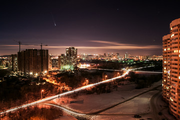 Buildings with Light Windows at Night Roads in Winter