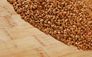 buckwheat groats on a wooden table