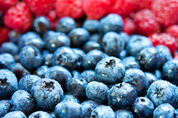 Background of blueberries and raspberries.