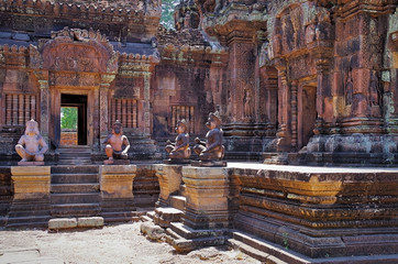 Monkey guardians at entrance to a sanctuary. Banteay Srei - pink temple, citadel of the women, or citadel of beauty. Is built of red sandstone and dedicated to the Hindu god Shiva. Cambodia, Angkor