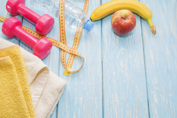 concept preparing to fitness sports equipment top view.