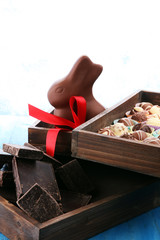 a lot of variety chocolate pralines, belgian confectionery gourmet chocolate and easter bunny.
