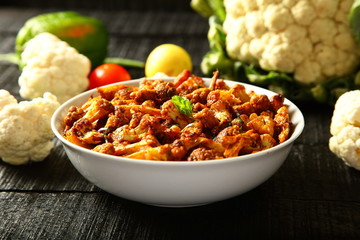 Pepper garlic stir fry roasted curry cauliflower.