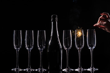 catering service. Silhouette champagne in bucket. New year party champagne on black background