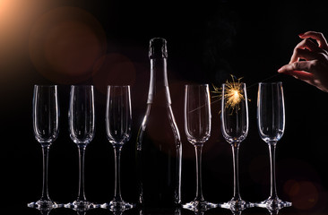 catering service. Silhouette champagne in bucket. New year party champagne on black background