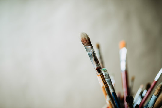 Close-up image of a group of artist's paint brushes