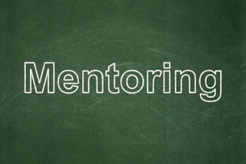Obraz premium Education concept: text Mentoring on Green chalkboard background