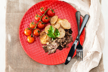 juicy steak veal beef meat with tomato and potatoes