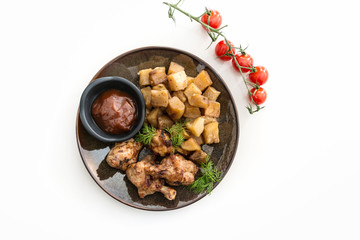 roasted sleeves chicken with potatoes and barbecue sauce