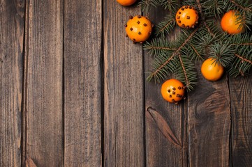 Christmas New Year composition with tangerines and pine cones