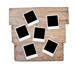 old photos on a wooden board