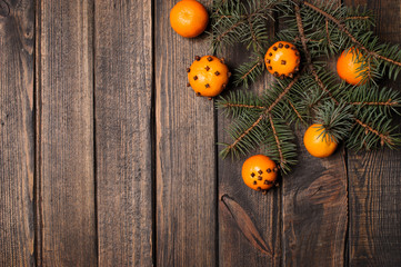 Christmas New Year composition with tangerines and pine cones