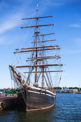 Vintage black brig stands moored in Helsinki