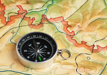 Fototapeta na wymiar compass on a map