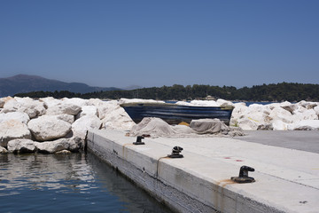 A typical Greek fishing boat at the old port of Corfu