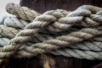 Fototapeta na wymiar Ropes from an old sailing boat, close-up.