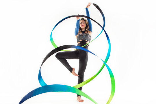 The portrait of beautiful woman gymnast on white