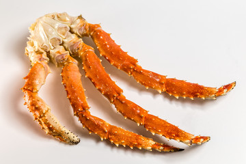 claw of a king crab on a white background