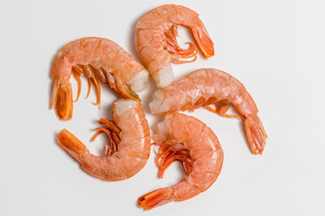 shrimp langoustine lie on a white background