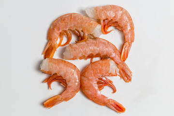 shrimp langoustine lie on a white background