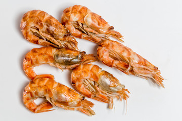 shrimp langoustine lie on a white background