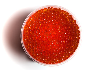 red caviar salmon in a jar on a white background