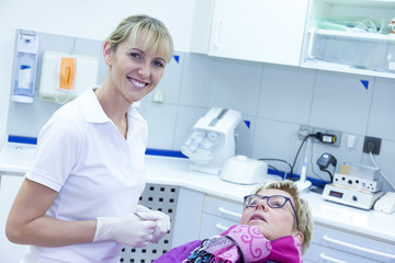 The dentist treats the patient's teeth