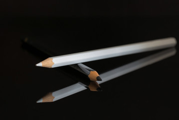 Black and white wooden crayon