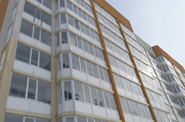 Modern multistory apartment building. Residential building. Building fragment. Apartment block. Contemporary architecture