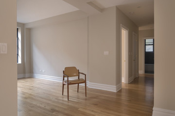 single chair in empty room