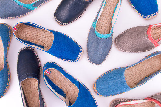 Colored Espadrilles On A White Background.