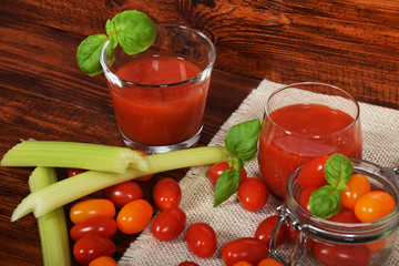 fresh tomato juice with celery from mini tomatoes for a good desire for summer and winter with free space for text