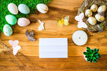 Blank lightbox with free copyspace and easter decorations from above