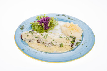 delicious grilled steak topped with cheese sauce served with salad and potato puree