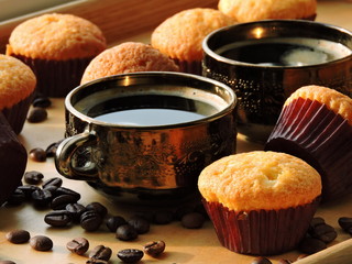 Mini muffins, coffee and coffee beans.