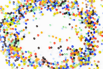 Multi-colored beads on white