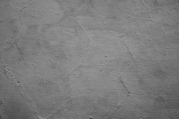 Wall fragment with scratches and cracks