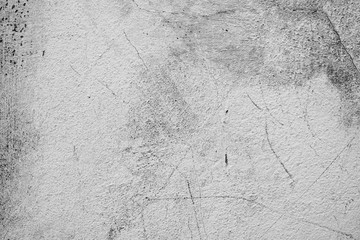 Wall fragment with scratches and cracks