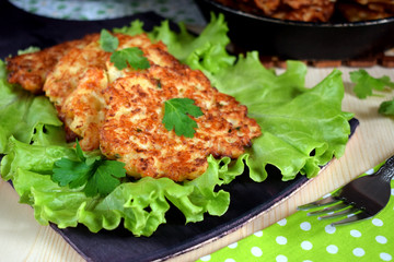 Vegetable pancakes on lettuce leaves. Vegetarian meal
