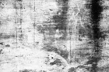 Wall fragment with scratches and cracks