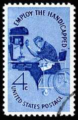 Vintage 1960 United States of America cancelled postage stamp showing Employ the Handicapped