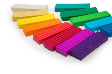 Fototapeta premium colored plasticine on isolated white background