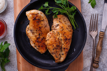 Grilled chicken breast or fillet on iron pan